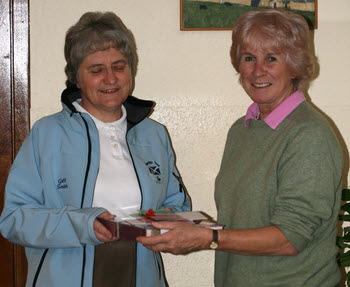Photograph of Fiona Glass presenting gifts to Gill Smith prior to her departure on the 2013 Swedish Tour